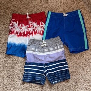 Size S/6-7 bundle of 3 pairs of boys swim trunks from Old Navy.